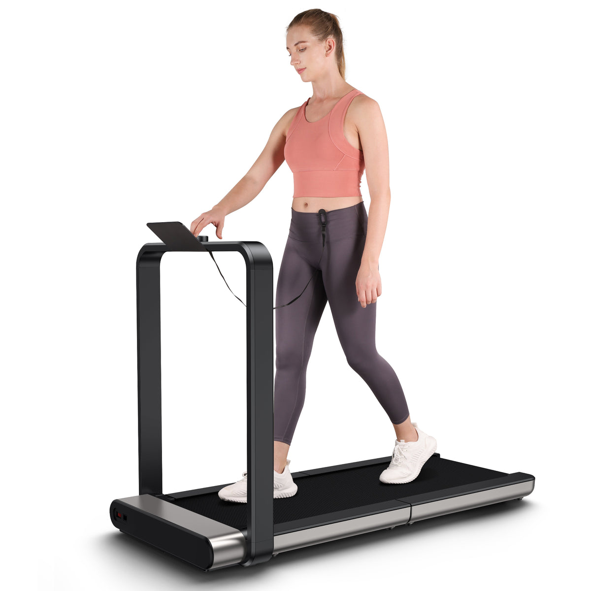 Woman walking on WalkingPad X21 Foldable Running Treadmill on white 