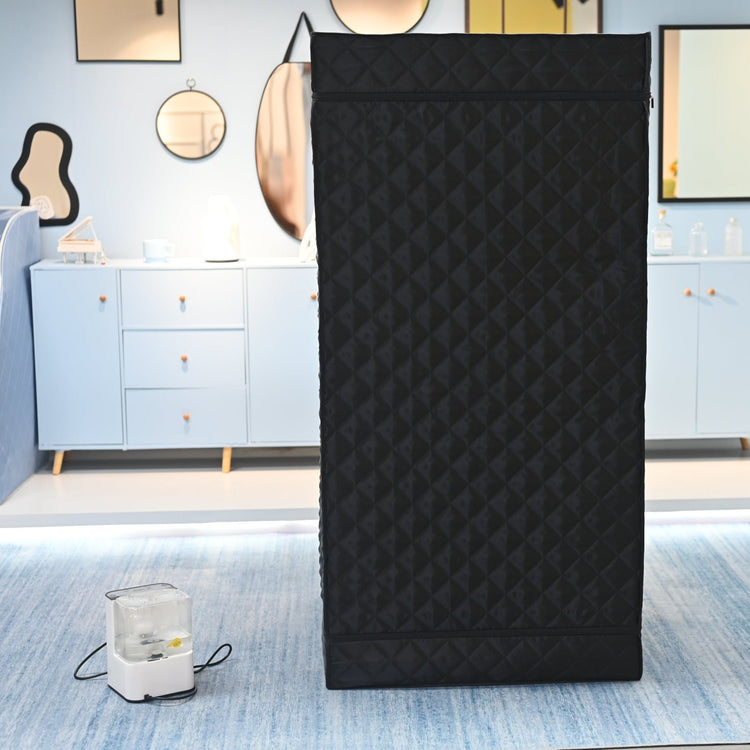 Ezlife Portable steam sauna in a room with steamer on the ground 