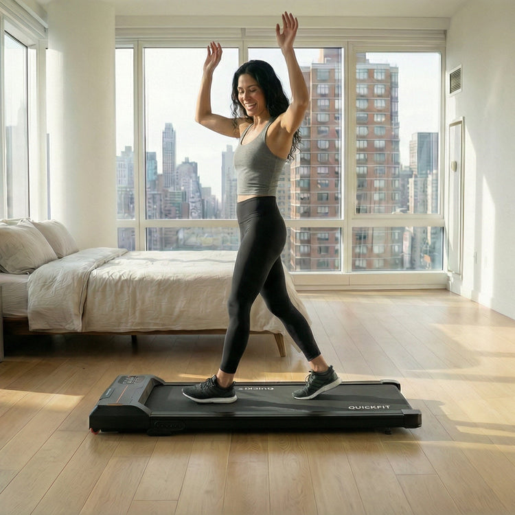 Fit woman losing weight while walking at home in her apartment