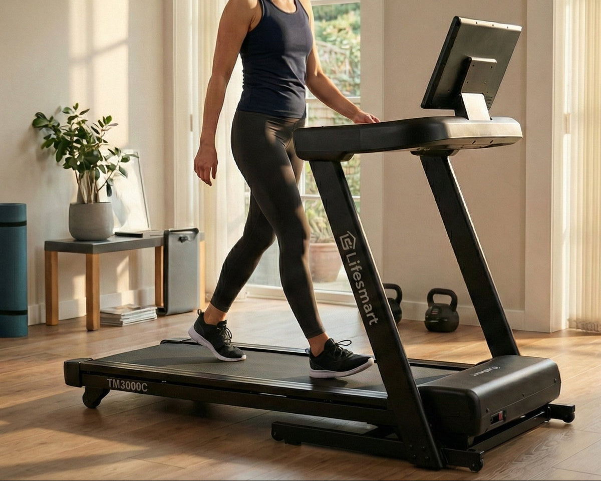 Woman using a LifeSmart treadmill in a home setting