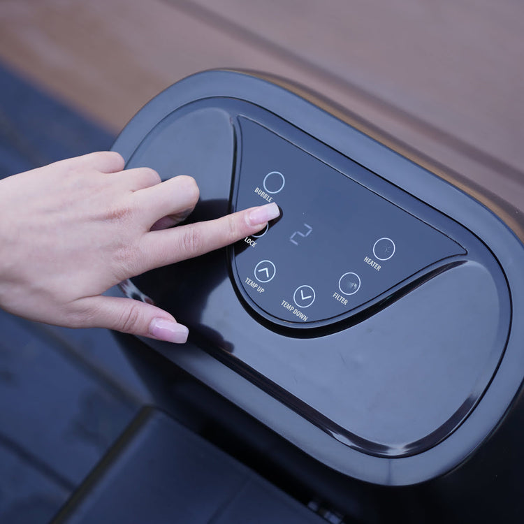 Close up of control panel button console. Woman pressing button on face of display.