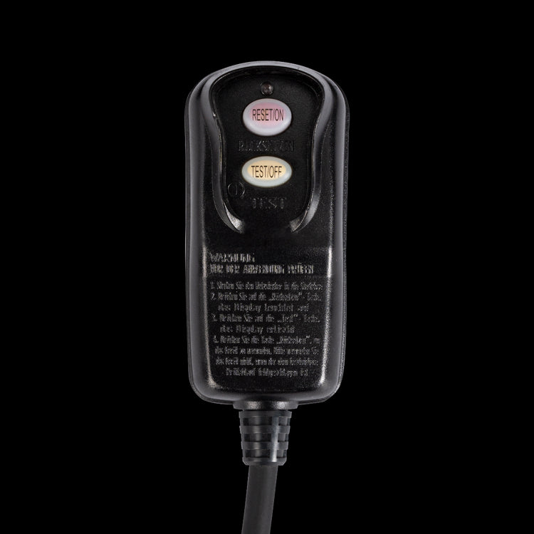 Plug for the spa with a reset/on button and a test/off button.