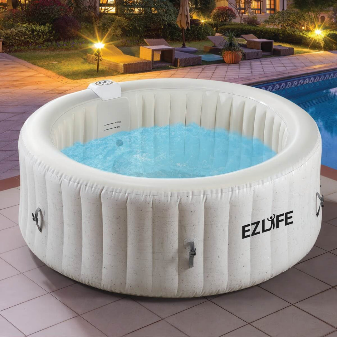 4 Person Inflatable Round Hot Tub on patio in evening time.