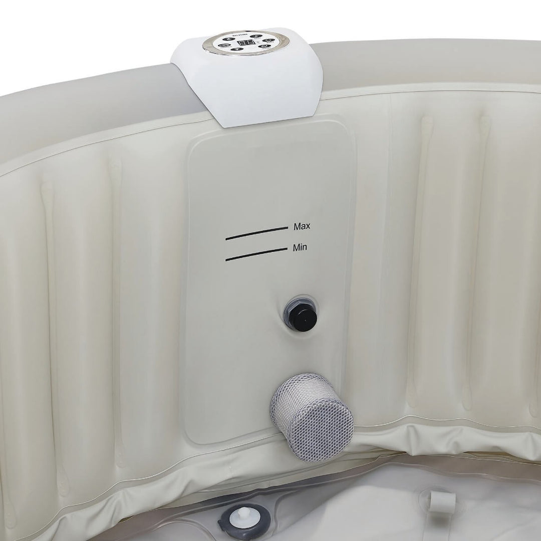 Interior view of inflatable hot tub showing the minimum and maximum water line.