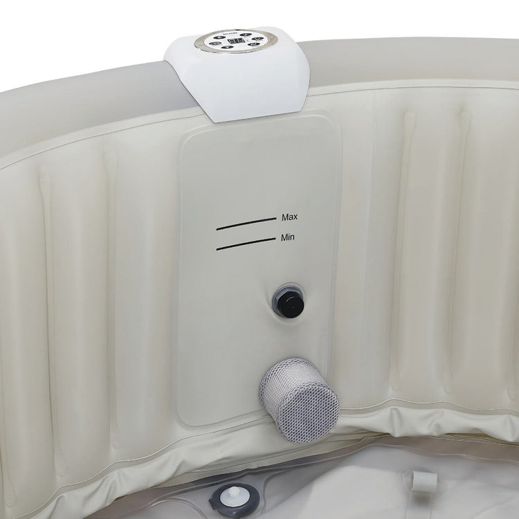 Interior view of inflatable hot tub showing the minimum and maximum water line.