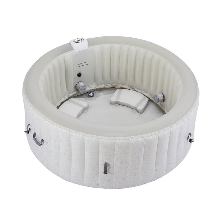 Round inflatable hot tub with white interior without water on a white background