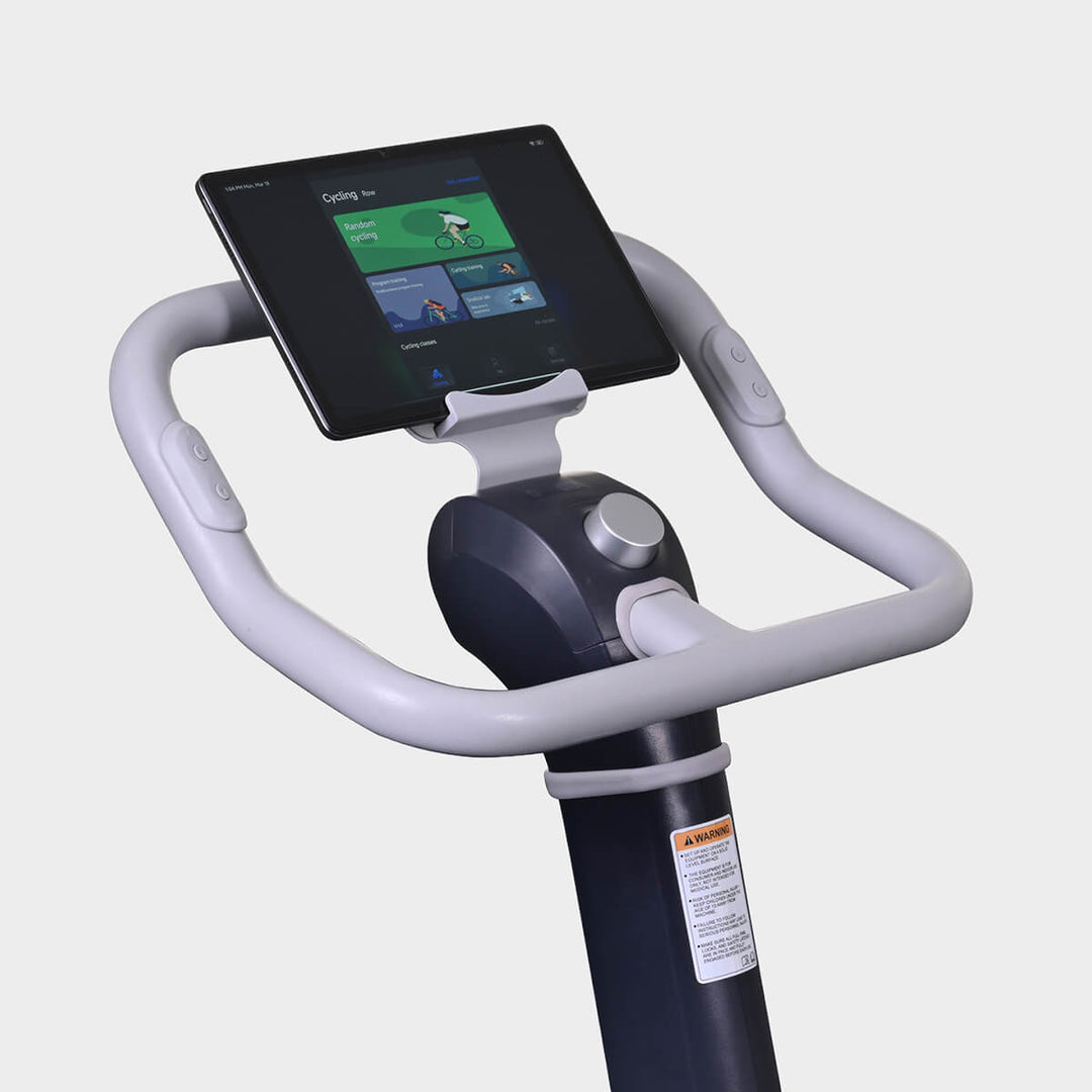 Closeup of the S1 bike's console and tablet holder. Tablet not included.