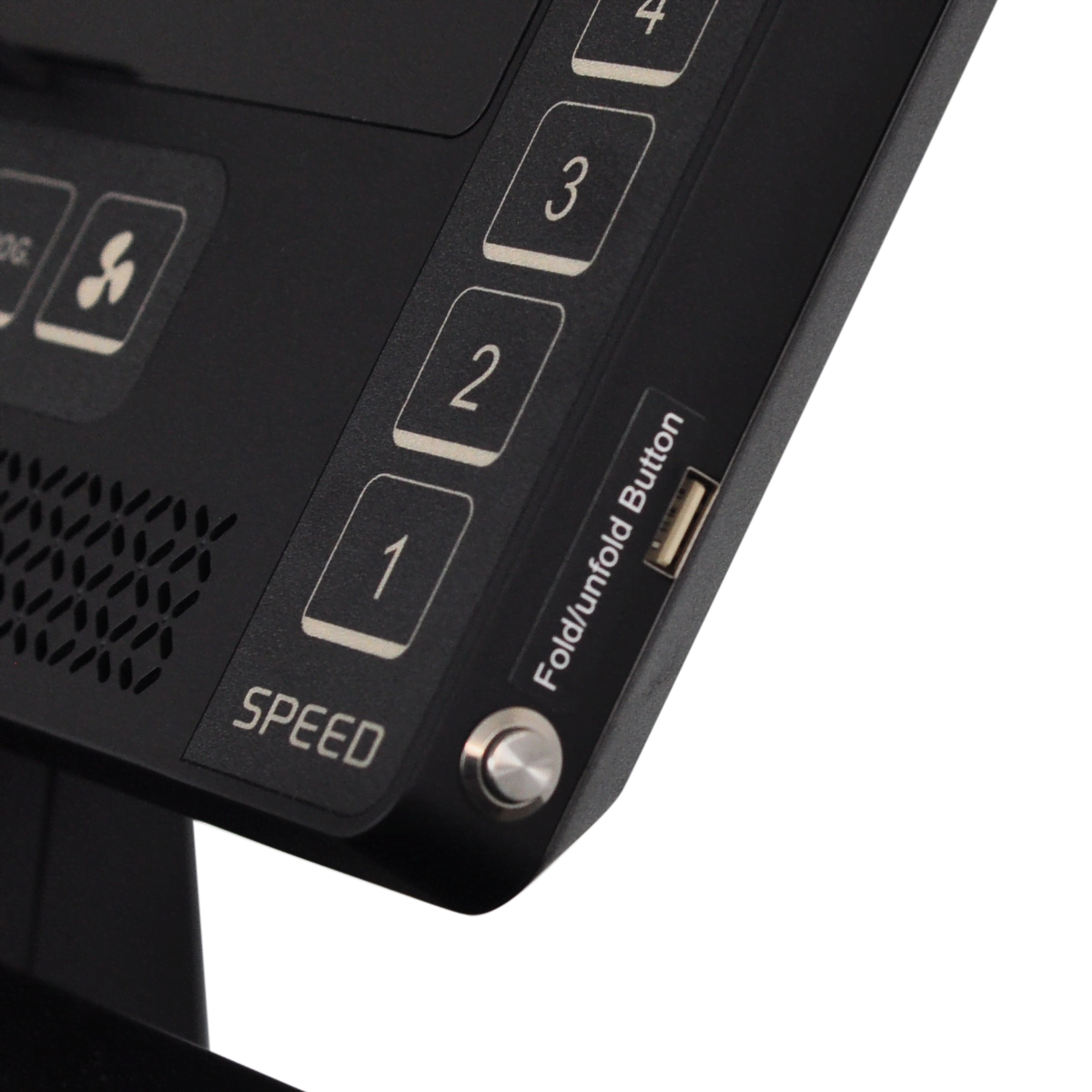 A close up of the side of the console that features the fold/unfold button as well as a USB charger.