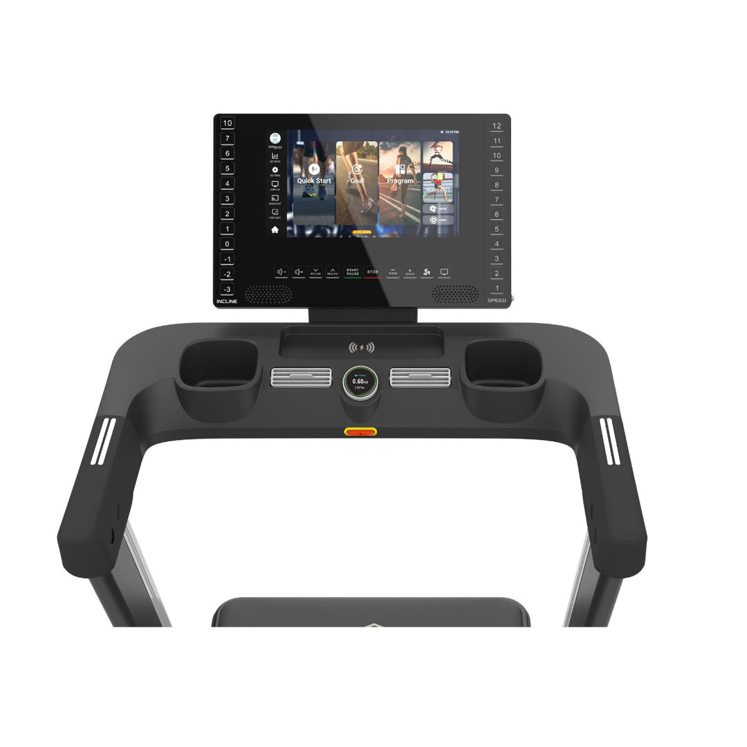 Angled shot of treadmill's console area showing its features, such as the EKG grips, fans, and touchscreen.
