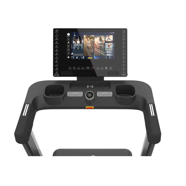 Angled shot of treadmill's console area showing its features, such as the EKG grips, fans, and touchscreen.