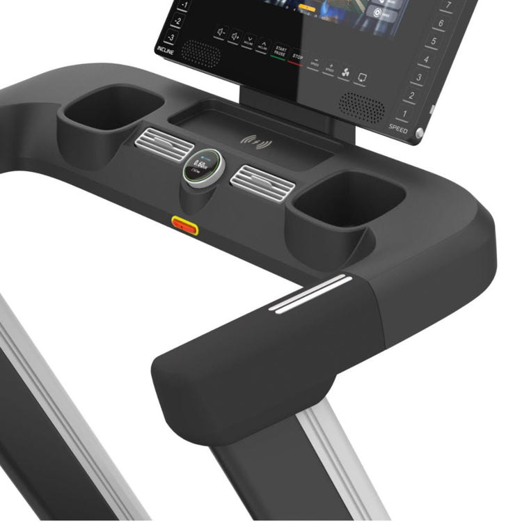 Close up showing EKG grips on handles of treadmill.