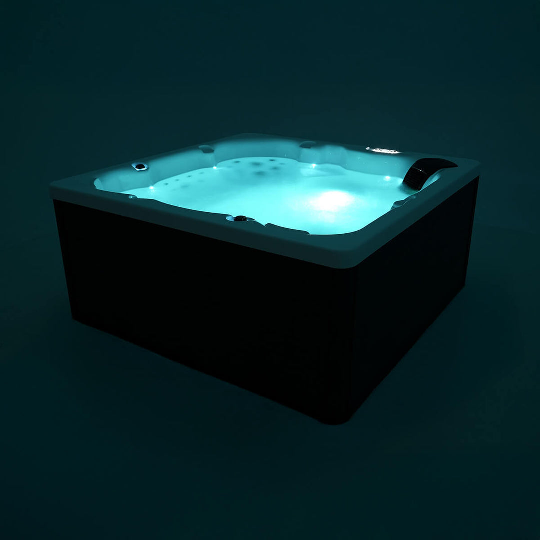 Studio product shot with water in spa and blue light for mood lighting.