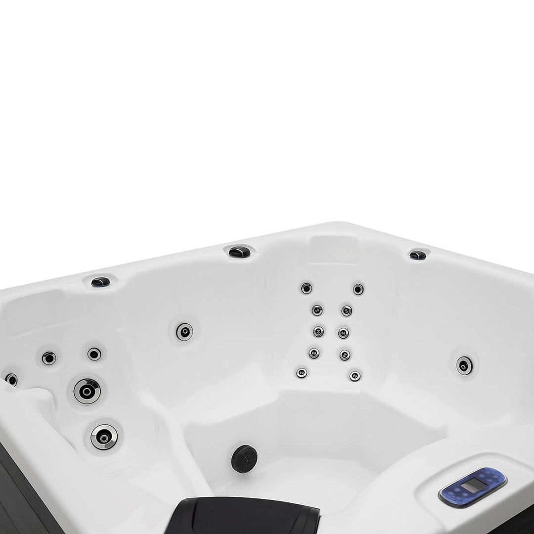 White interior of spa showing multiple jets.