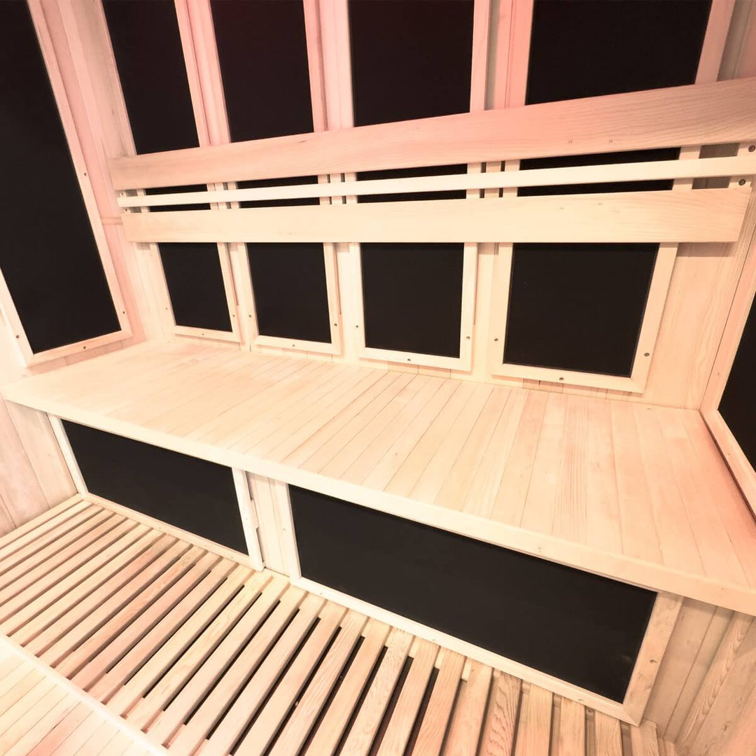 Inside of sauna showing wood interior as well as heaters.